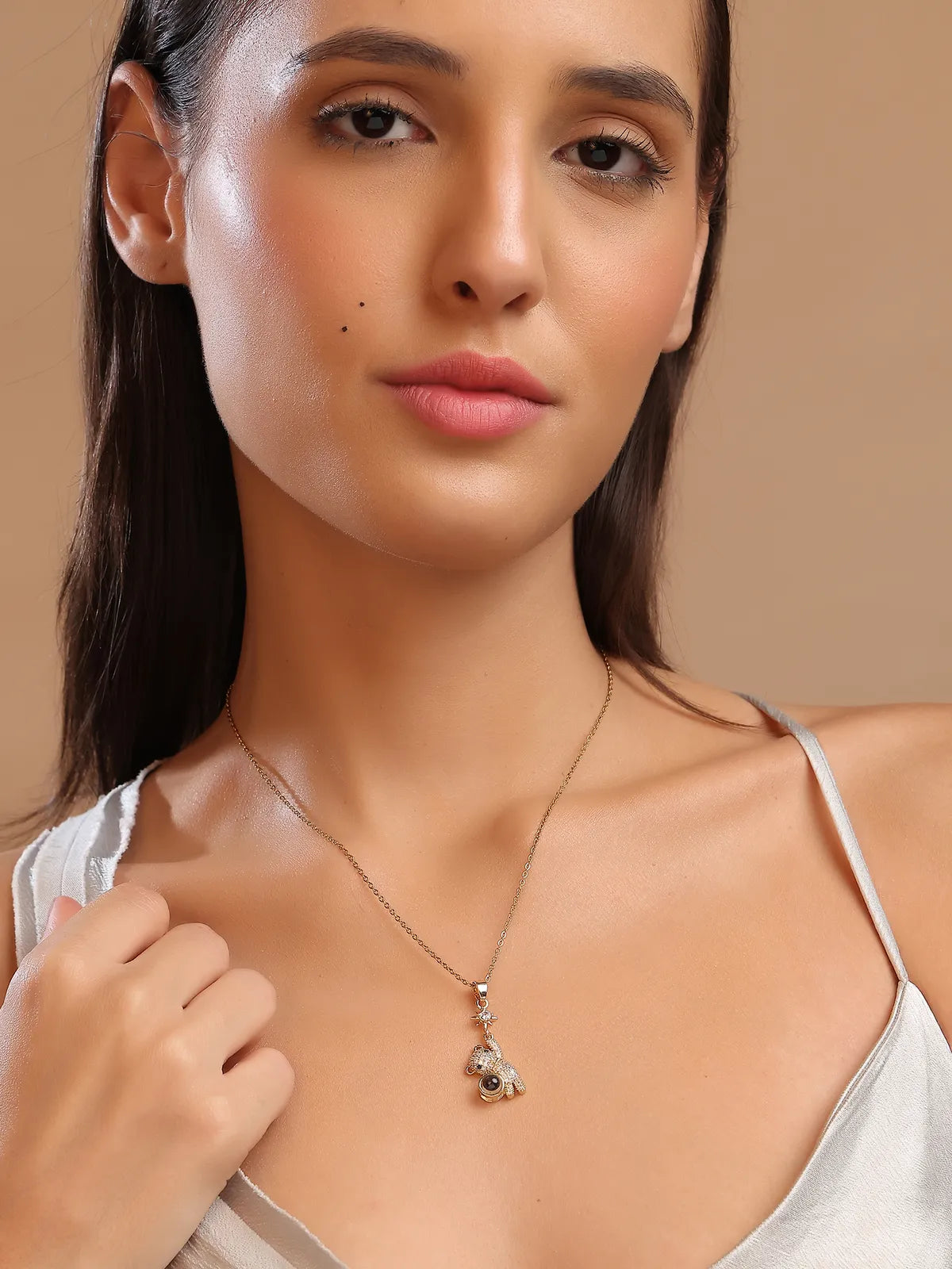 Gold-Tone Teddy Bear Pendant with Star and Crystal Detailing